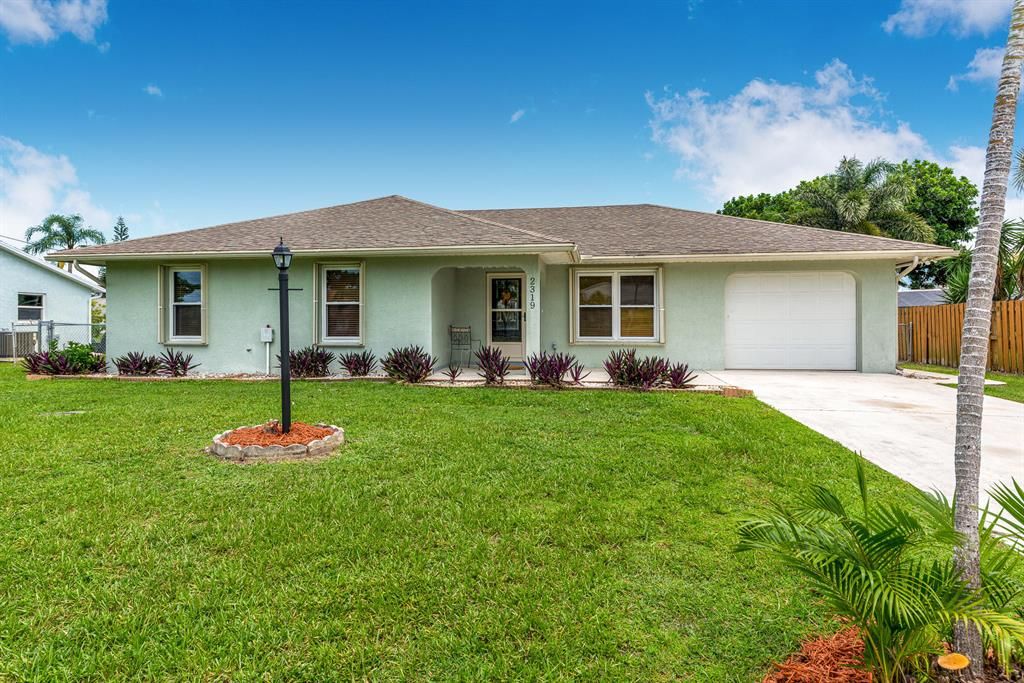 Photo of 2319 SE Avalon Road, Port Saint Lucie, FL 34952 (MLS # R10738486)