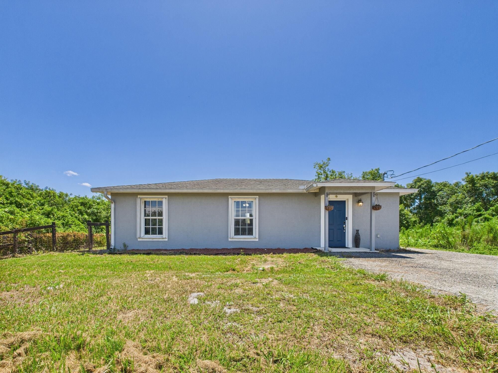 Move-in ready 3BD/2BA CBS home built in 2006, located on Okeechobee's desirable east side--perfect for commuters! This solid home features accordion storm shutters and will come with a brand-new A/C installed prior to closing. The backyard is fully fenced, offering privacy and space, plus a utility shed for extra storage. While front parking is limited, the driveway allows access along the right side of the home with a circle-around option in the backyard. A great value in a convenient location