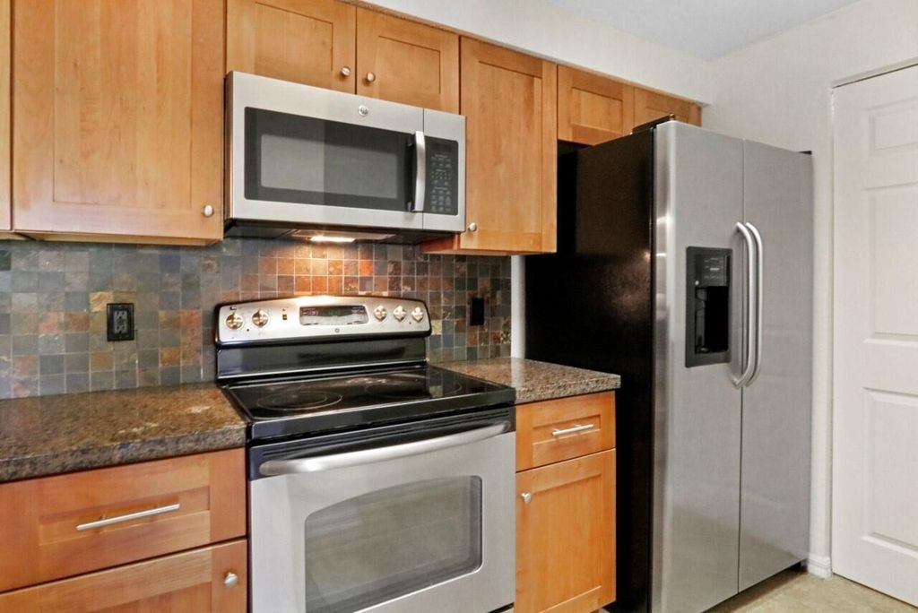 Photo of 3022 Alcazar Place #302, Palm Beach Gardens, FL 33410 (MLS # R11087023)