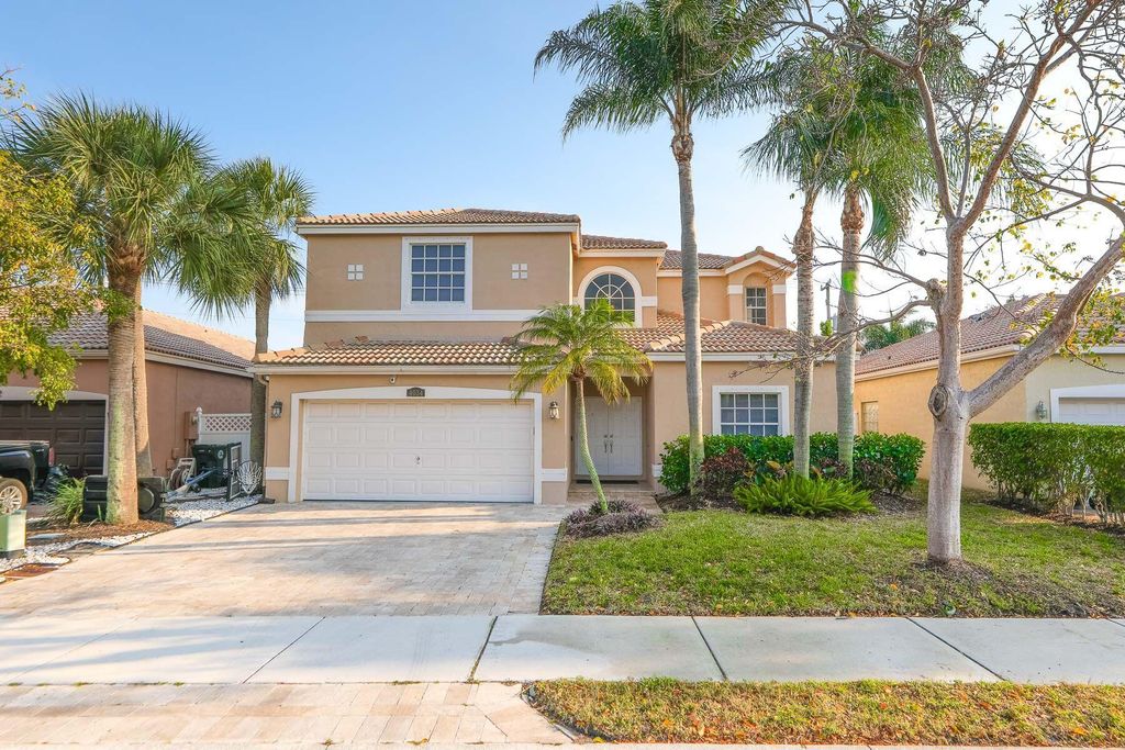 Photo of 4034 NW 62 Court, Coconut Creek, FL 33073 (MLS # R10872475)