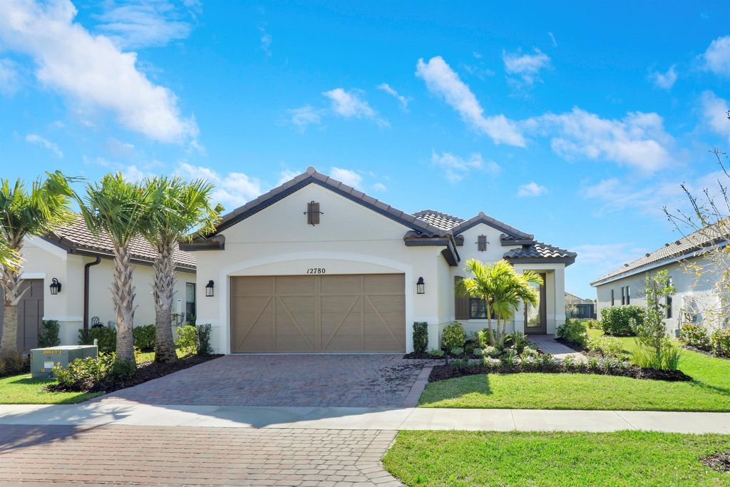 Photo of 12780 SW Ambra Street, Port Saint Lucie, FL 34987 (MLS # R10962658)