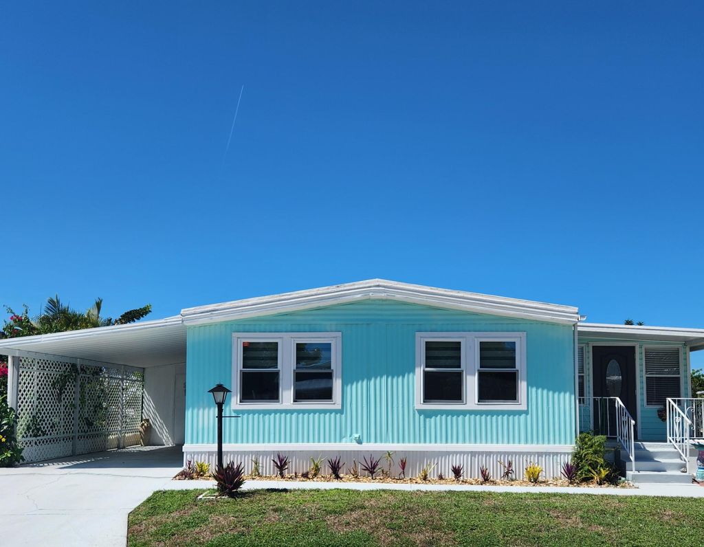 Photo of 162 S Warner Drive, Jensen Beach, FL 34957 (MLS # R11169601)