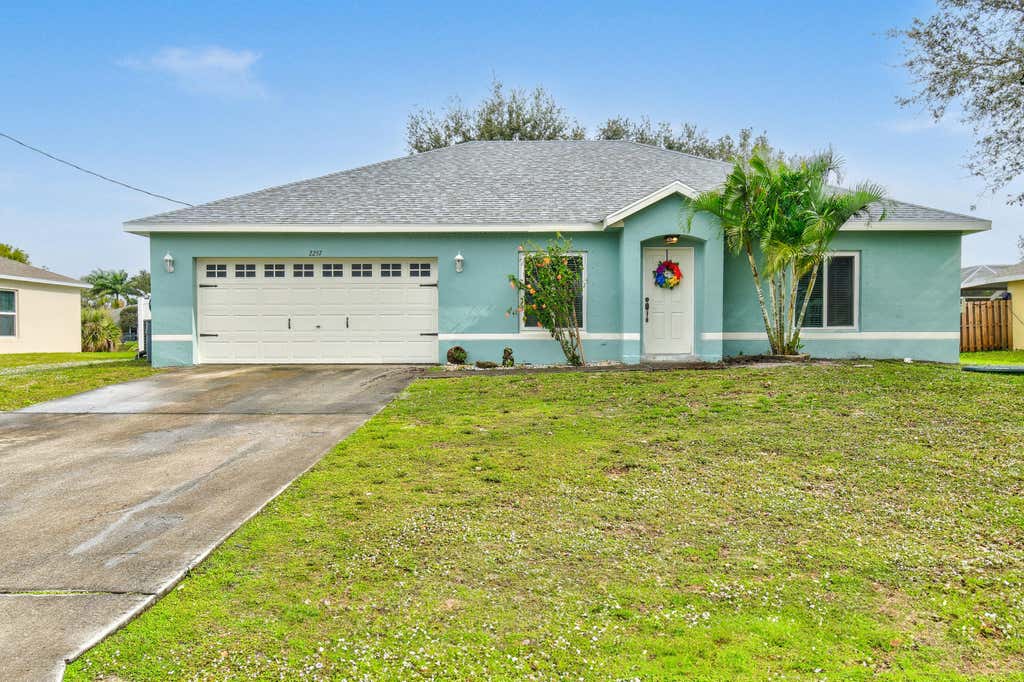Photo of 2257 SW Chestnut Lane, Port Saint Lucie, FL 34953 (MLS # R10951097)