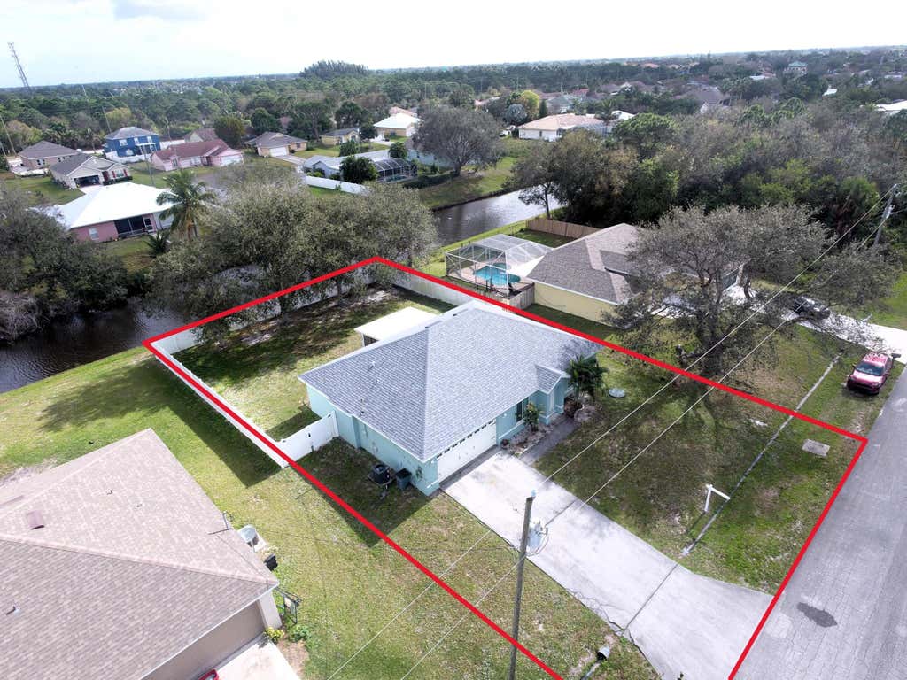 Photo of 2257 SW Chestnut Lane, Port Saint Lucie, FL 34953 (MLS # R10951097)