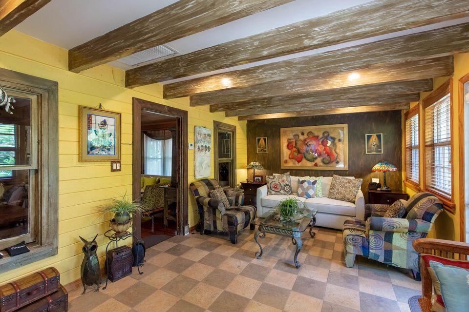 YOU WILL BE THE TALK OF YOUR FRIENDS LIVING IN THIS HISTORICAL HOME. FAMILY ROOM IS 20 FEET BY 12 WITH LOTS OF WINDOWS OVERLOOKING TROPICAL GARDEN. HARDWOOD FLOORS, REMODELED KITCHEN, BATHROOM, LONG DRIVEWAY FOR AT LEAST 4 CARS...MASTER BEDROOM IS 15 BY 12 , WITH CUSTOM ARMOIRS AS CLOSETS!, INDULGE