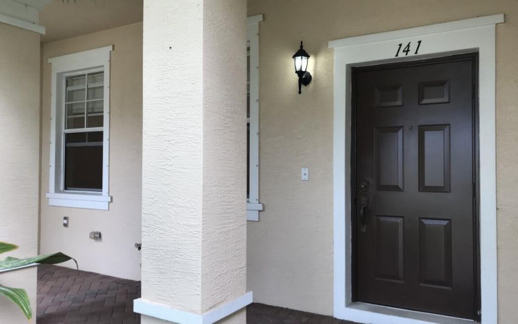 Photo of 141 E Thatch Palm Circle, Jupiter, FL 33458 (MLS # R10933052)
