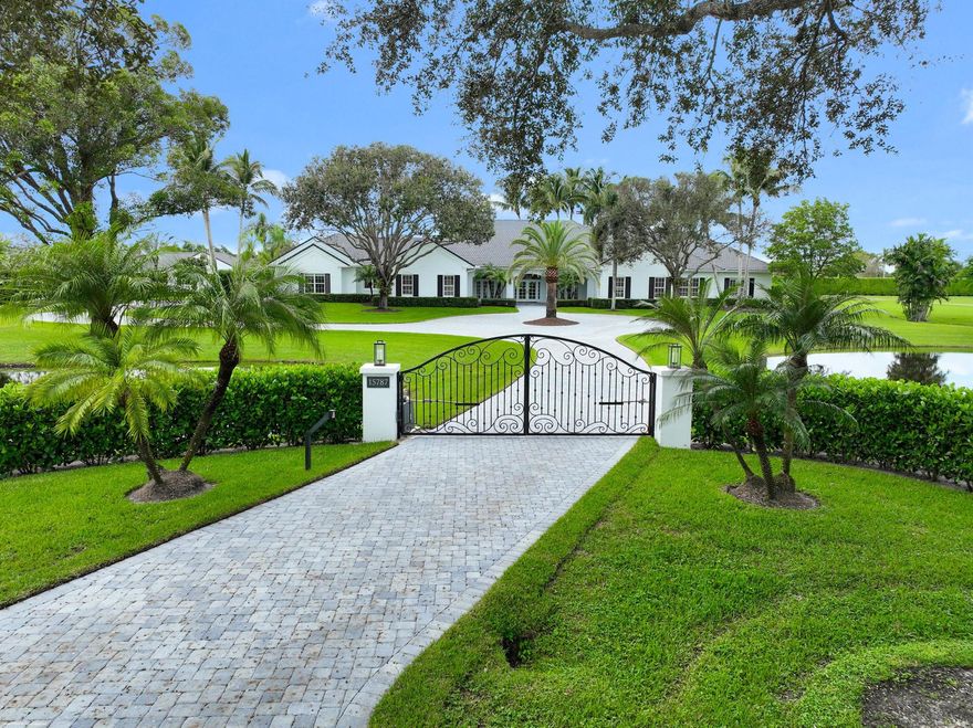 Prime Location! 5 acre farm conveniently located on a cul-de-sac w/ easy access to the front gate of Palm Beach Point & true hacking distance to WEF. This equestrian estate has recently been renovated & is move-in ready. The residence boasts a center-island kitchen w/gas cooking, media/game room with bar, new wood floors throughout, updated bathrooms & more! The12 stall barn & staff apt. were recently remodeled including new pavers in the aisleway. Riders will love the new 105' x 215' riding arena. There are currently 4 paddocks w/ ample room for more turnouts.