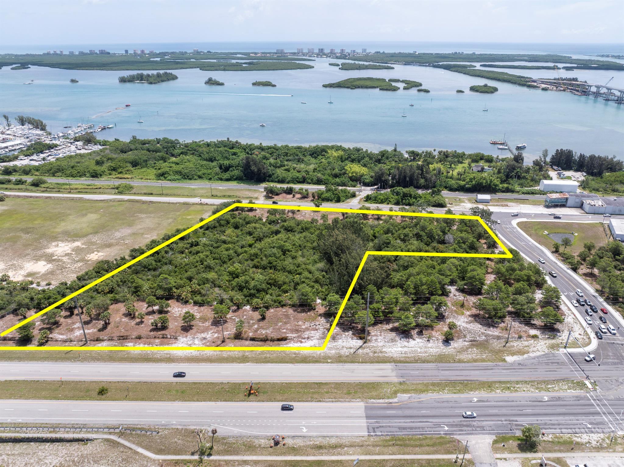 Prime 7.7 acre Riverview commercial/multifamily site with frontage on North US #1, New Juanita East extension and Old Dixie Highway. Potential to rezone to 15-18 units per acre. This property excludes the 2.5 acre corner at the Traffic Light. Great location near new $100 million bridge to North Hutchinson Island. All high and dry property. This parcel is a portion of a larger property and will be split under the City of Fort Pierce '' Minor Replat application process'' (See letter from City under documents tab).