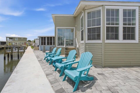 Photo of 166 NETTLES Boulevard, Jensen Beach, FL 34957 (MLS # B26083903)