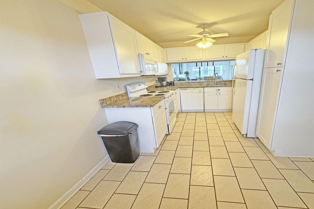 Photo of 7706 Tahiti 106 Lane #106, Lake Worth, FL 33467 (MLS # R11125002)