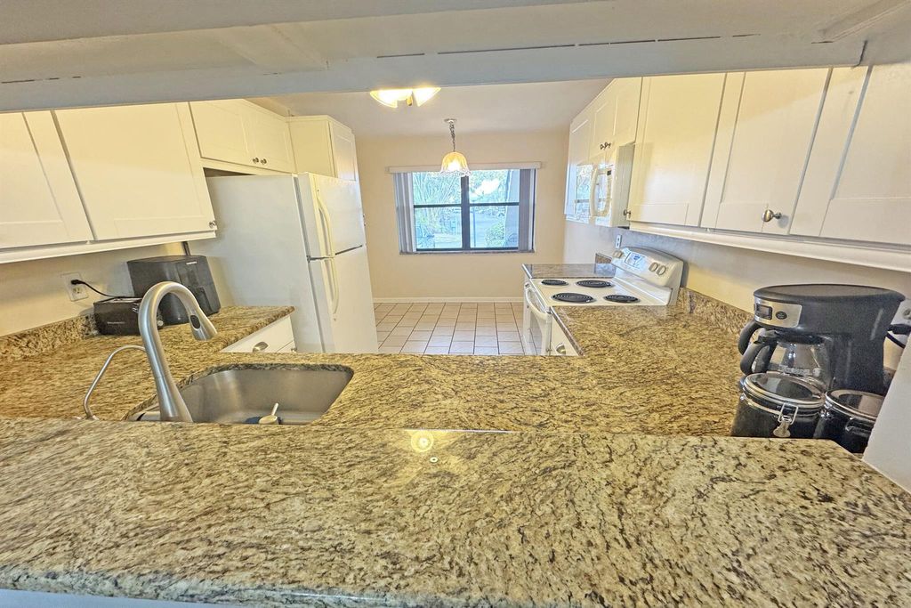 Photo of 7706 Tahiti 106 Lane #106, Lake Worth, FL 33467 (MLS # R11125002)