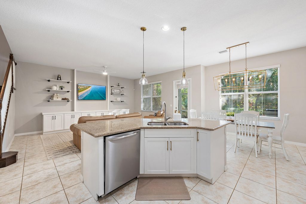 Photo of 1056 Piccadilly St, Palm Beach Gardens, FL 33418 (MLS # B26000970)