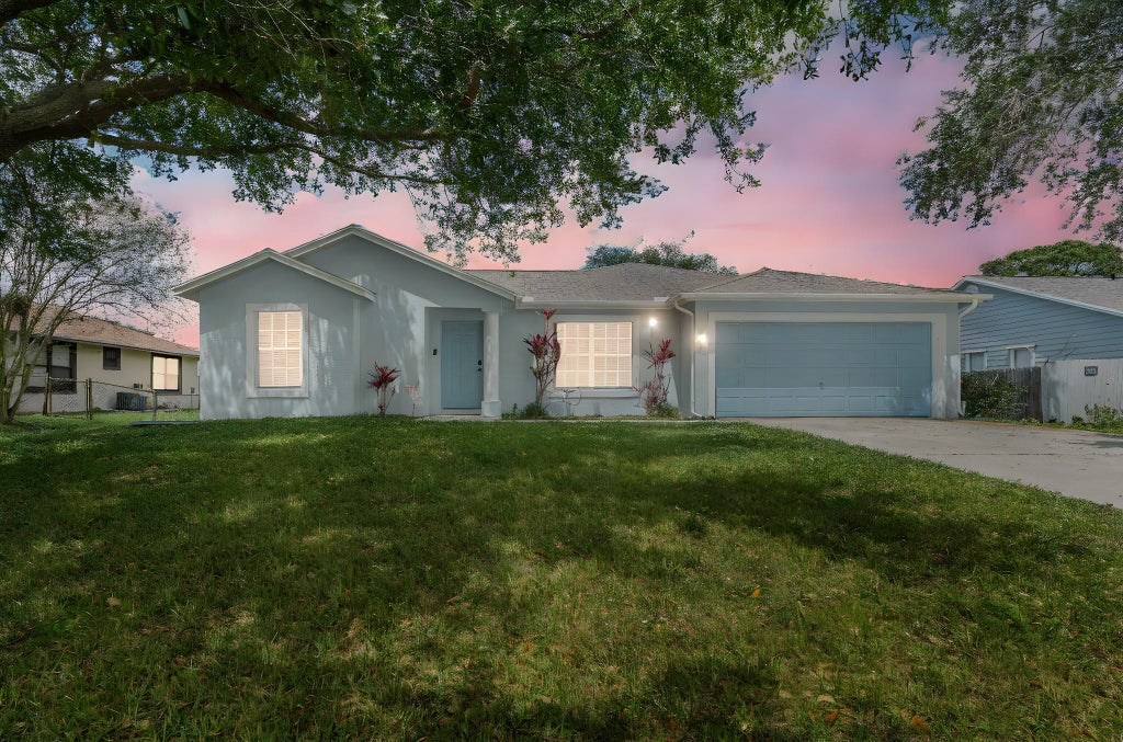 Photo of 401 SE Strait Avenue, Port Saint Lucie, FL 34983 (MLS # F10495686)