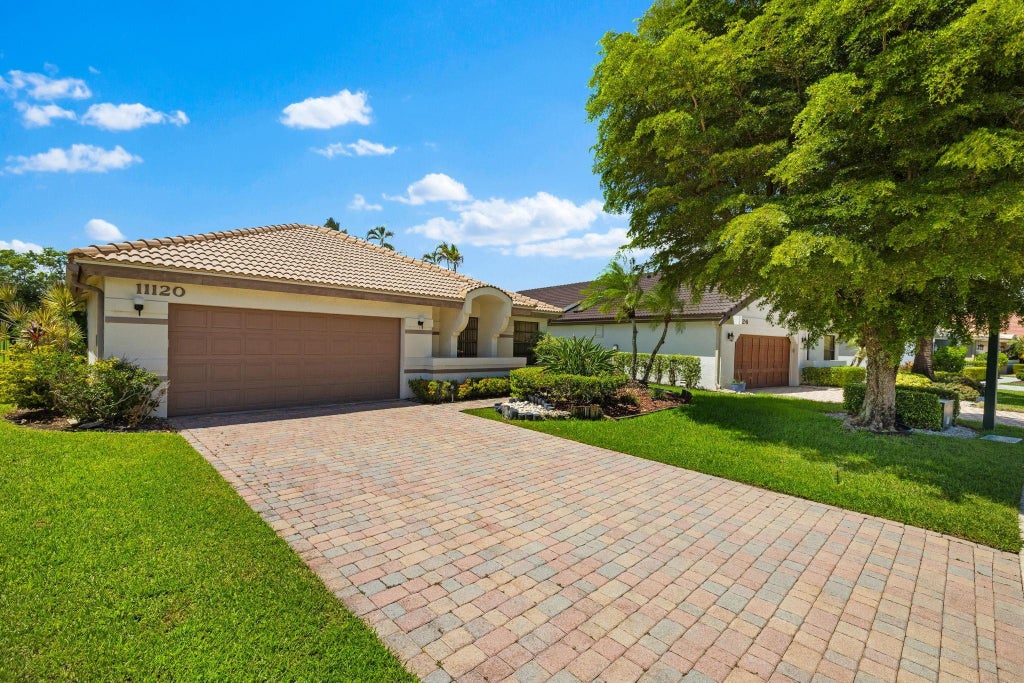 Photo of 11120 Clover Leaf Circle, Boca Raton, FL 33428 (MLS # F10459221)