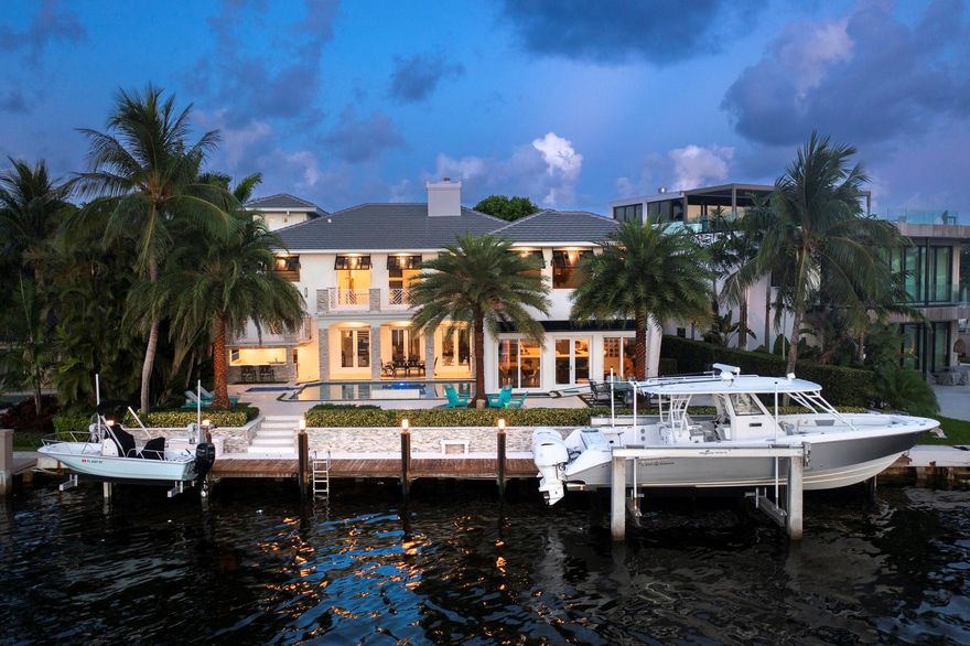 WHEN ONLY THE BEST WILL DO. EXQUISITE ESTATE IS LOCATED IN HILLSBORO SHORES. STRIKING DESIGN WITH BEAUTIFUL INTRACOASTAL VIEWS. THIS HOME HAS BEEN TOTALLY REMODELED. SIX BEDROOMS AND FOUR AND HALF BATHS. BEAUTIFUL CUSTOM BUILT INS. CUSTOM LIGHTING THAT ILLUMINATES THE FIRST FLOOR. NEW CRESTON HOME SYSTEM, GYM, THE SIXTH BEDROOM CAN BE TURNED INTO A HOME THEATER. GOURMET KITCHEN WITH QUARTZITE COUNTERTOPS, BUTLER'S PANTRY, THERMADOR AND MIELE APPLIANCES. PORCELAIN AND VENETIAN WOOD FLOORS THROUGHOUT. THE PRIMARY SUITE HAS INCREDIBLE WATER VIEWS. FOUR BALCONIES OFF BEDROOMS. BEAUTIFUL OUTDOOR LIVING SPACE WITH A SUMMER KITCHEN. 88 FEET ON THE WATER. 2 BOAT LIFTS INCLUDED, WHICH HOLDS A 24,000 LBS AND A 15,000 LBS. MINUTES TO HILLSBORO INLET. NO WAKE ZONE. PRIVATE BEACH. THIS IS A MUST SEE!