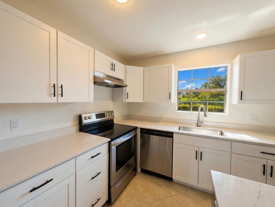 Welcome to this inviting 2-bedroom, 2-bathroom residence located on the desirable first floor, offering easy access and everyday convenience. This home features an open floor plan that creates a bright and spacious living environment, perfect for both relaxing and entertaining.  The kitchen is highlighted by an oversized countertop, providing ample space for cooking, dining, and gathering. The layout flows seamlessly into the living and dining areas, enhancing the overall functionality of the home.  Enjoy added privacy with a covered patio, ideal for morning coffee or unwinding in a quiet outdoor setting. Both bedrooms are generously sized, with well-appointed bathrooms for comfort and convenience. Ideally situated with easy access to major roads, shopping, dining, and public transportation, this property offers both comfort and accessibility in a prime Coral Springs location. Enjoy your Showing!