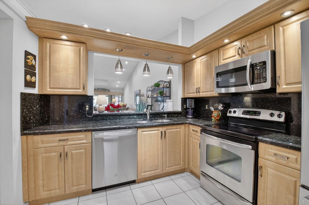 Photo of 10039 Andrea Lane #A, Boynton Beach, FL 33437 (MLS # B26028472)