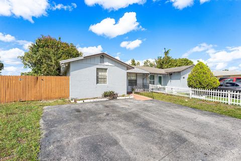 Photo of 5177 Cannon Way, West Palm Beach, FL 33415 (MLS # B26005961)