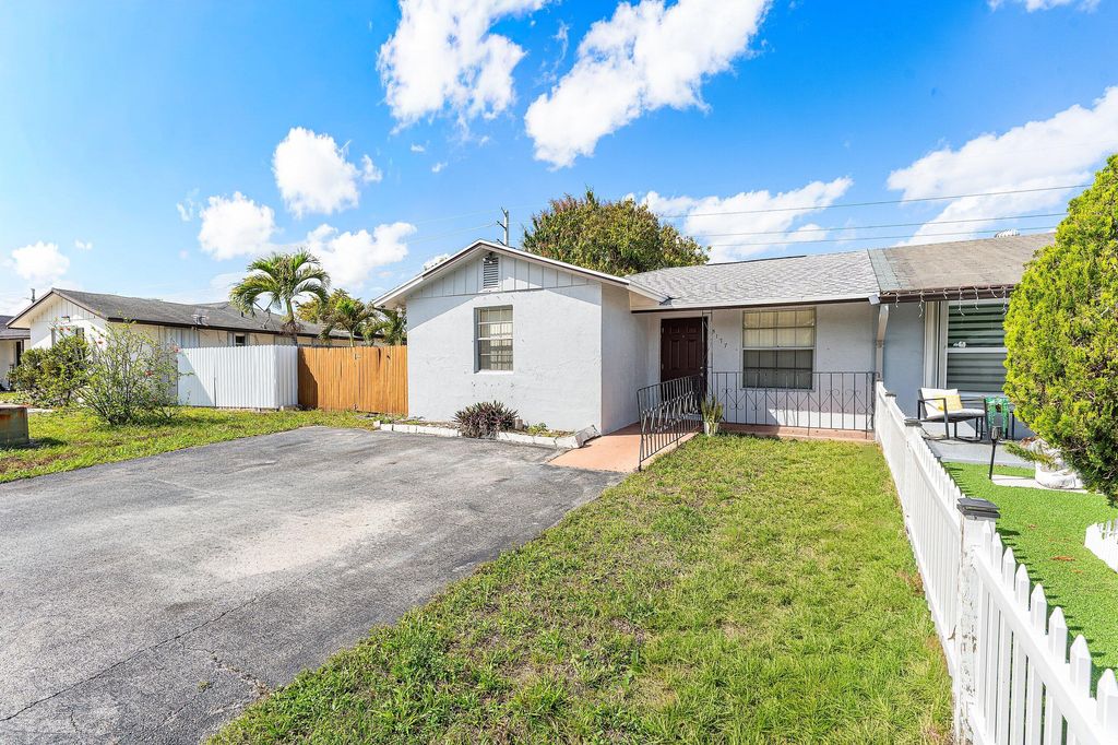 Photo of 5177 Cannon Way, West Palm Beach, FL 33415 (MLS # B26005961)
