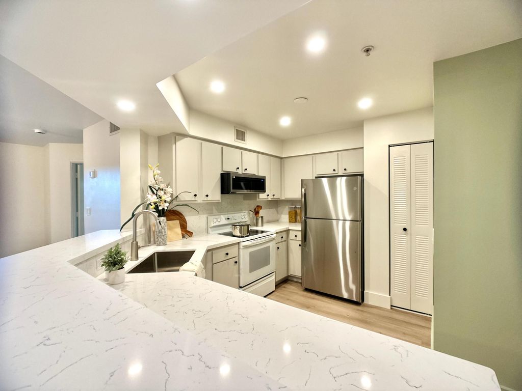 Photo of 700 Scotia Drive #305, Hypoluxo, FL 33462 (MLS # B26029963)