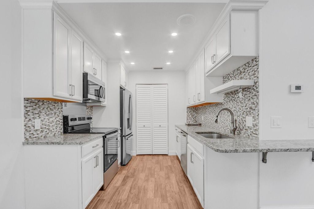 Photo of 8420 SE Croft Circle Circle #E-7, Hobe Sound, FL 33455 (MLS # R11124719)