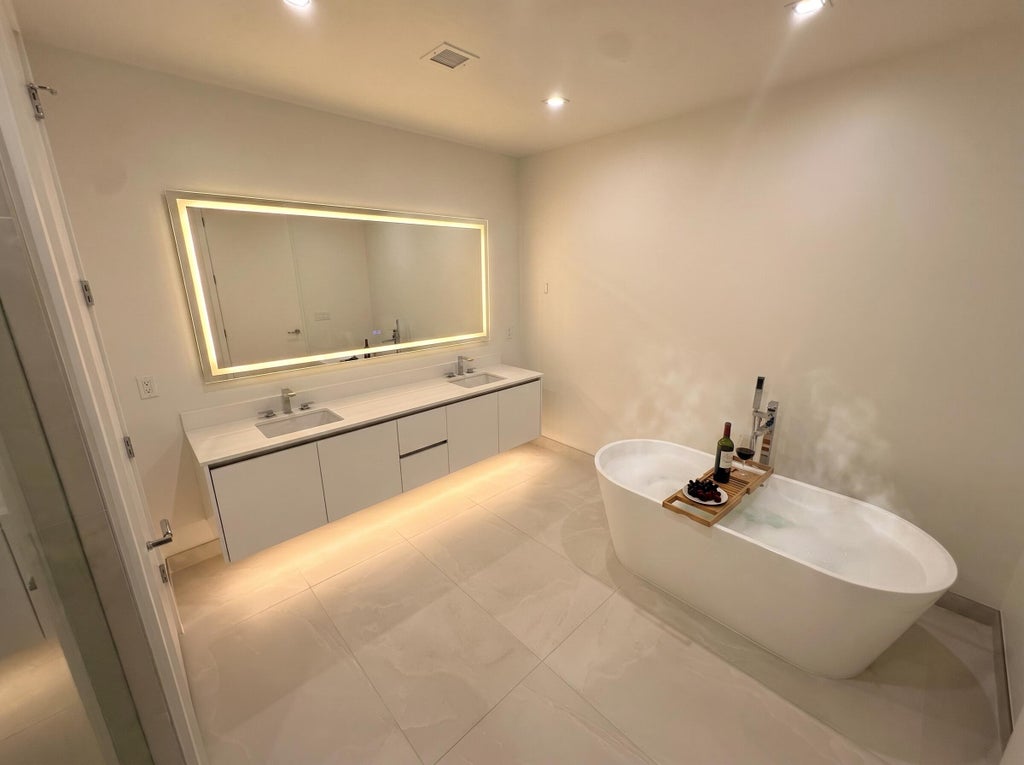 Photo of 220 Lake Shore Drive #909, Lake Park, FL 33403 (MLS # B26028836)