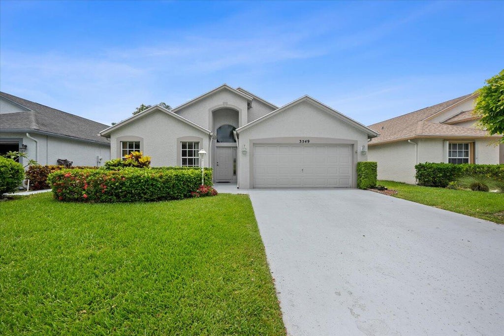 Photo of 3549 Dora Lane, West Palm Beach, FL 33417 (MLS # B26039686)