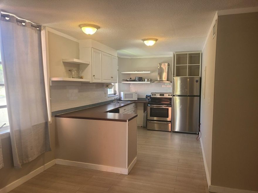 Bright & Modern Condo in Prime LocationUpdated, light-filled condo with a serene garden-like setting next to a lake and pool in a secure gated community. Minutes from Skylake Plaza’s shops, dining, and amenities. Ideal for investors, vacationers, or anyone seeking a clean, modern home in a vibrant, growing area. Assigned parking near the front door, close to major highways, between two international airports, and near public transit. Short distance to Greynolds Park, golf, Aventura Mall, and Brightline Station. SA paid in full!