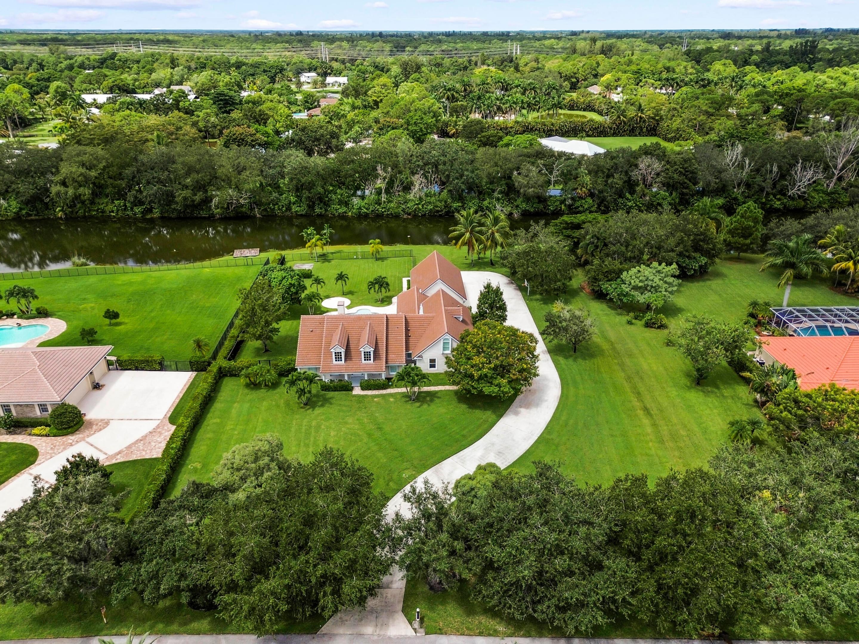 5703 Lago Del Sol Drive, Lake Worth, FL, 33449/$1,570,000 4 5703 Lago Del Sol Drive