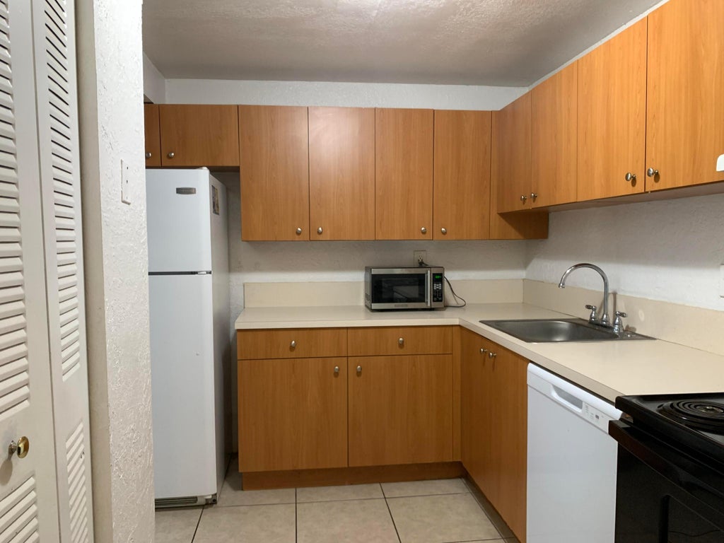 Photo of 431 Executive Center Drive #206, West Palm Beach, FL 33401 (MLS # B26069566)