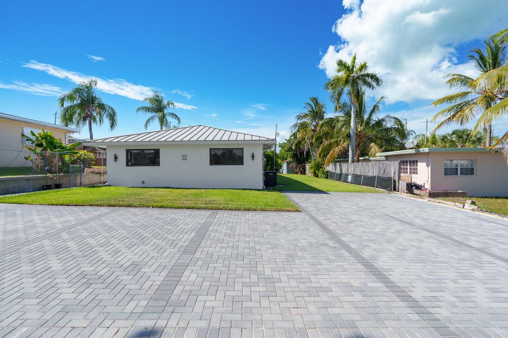 Photo of 303 De Carie Street, Delray Beach, FL 33444 (MLS # R11110454)