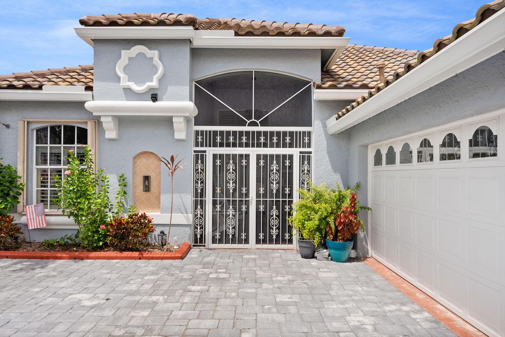 Photo of 616 SW Lake Charles Circle, Port Saint Lucie, FL 34986 (MLS # R11125443)