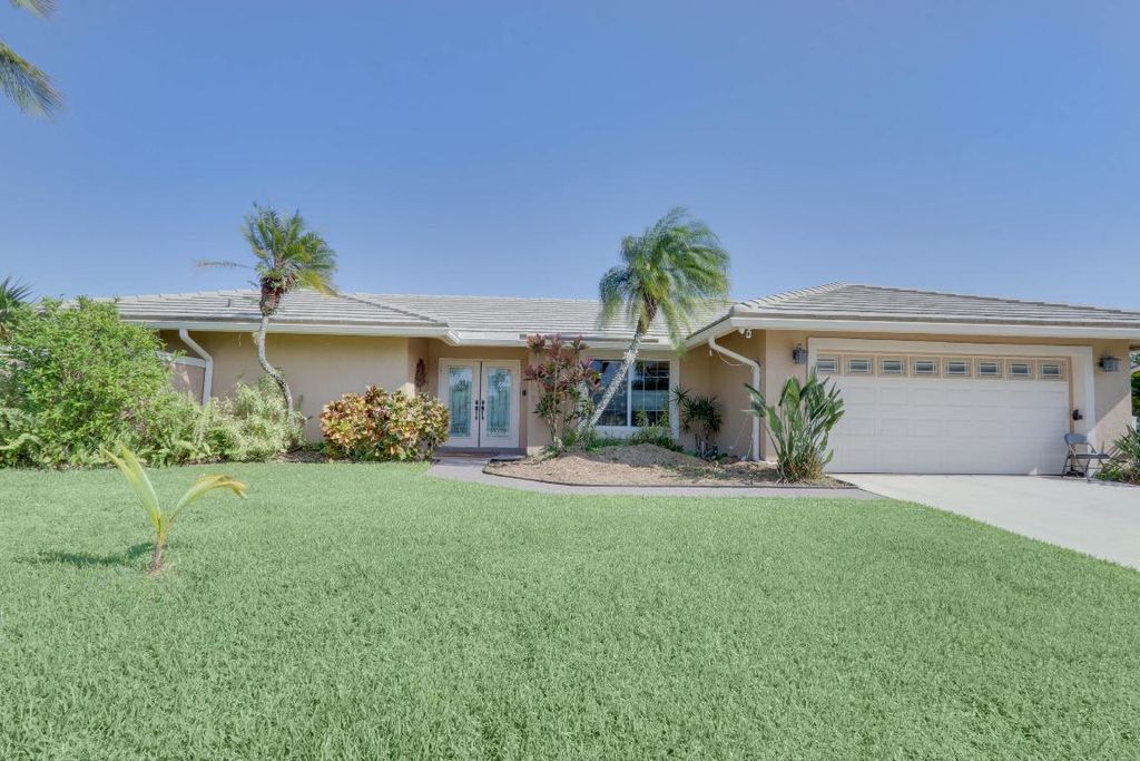 Photo of 1855 Lotus Ln, Wellington, FL 33414 (MLS # R11093740)