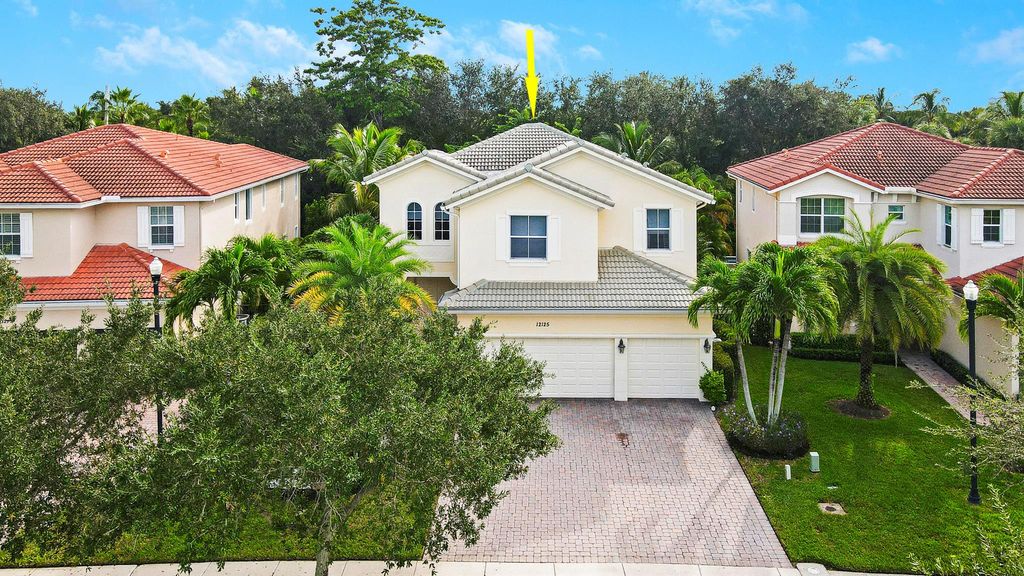 Photo of 12125 Aviles Circle, Palm Beach Gardens, FL 33418 (MLS # R11004694)