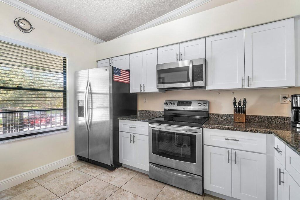 Photo of 2101 Sabal Ridge Court #H, Palm Beach Gardens, FL 33418 (MLS # R10927328)