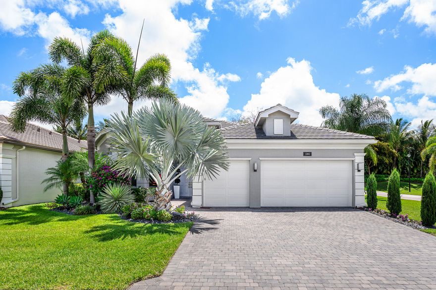 This beautifully appointed home sits on an oversized lushly landscaped corner lot. The home (3/3+3cg) features impact windows, whole house generator, gutters, newer A/C compressor (2021), termite protection, porcelain tile floors, custom wall treatments, designer lighting, LED hi-hats, fans, custom drapes, Hunter Douglas Silhouettes, upgraded baths & more! The chef's kitchen has white wood cabinets, built-in pantry cabinet with drawers, quartz countertops, glass tile backsplash & all the bells & whistles! There is an island/snack bar, breakfast area & formal dining room. Family room with custom built-in. Primary suite with outfitted walk-in closets. Two guest bedrooms - one is ensuite. The living room could be a den. Sit on the covered screened patio and enjoy the private treed rear yard. Valencia Bay is a premier 55+ lifestyle community featuring a spectacular 33,000 square-foot clubhouse and 8 acre outdoor recreational facility. Endless activities and opportunities for fun abound - there are activities, trips, shows, and clubs of all types. The clubhouse features an expansive foyer and lobby, grand ballroom with raised stage, dance floor and two small bars, three spacious card rooms, Arts and crafts room with kiln, Billiards room/internet, Catering kitchen, Cooking studio, Men's and women's locker rooms with showers, Yoga & exercise studio and separate, fully equipped fitness center. There is a Cafe with indoor/outdoor seating and a large pool bar. There are three pools - a beautiful Resort-style pool with Swimmers' Lap Lanes and Shade Pavilions, Resistance walking pool, Grandchildren's wading pool, and an Outdoor whirlpool spa. There are six har-tru tennis courts with shade pavilions, tennis pro shop, tennis pro, league play, six pickleball courts with league play, 2 bocce courts and league play, 2 handball courts, half-court basketball and walking/jogging/biking paths just outside the community. Valencia Bay is conveniently located near shopping, restaurants, houses of worship and major highways!