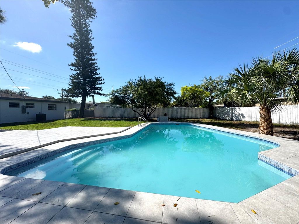 Photo of 411 SW 31 Avenue, Fort Lauderdale, FL 33312 (MLS # F10504818)