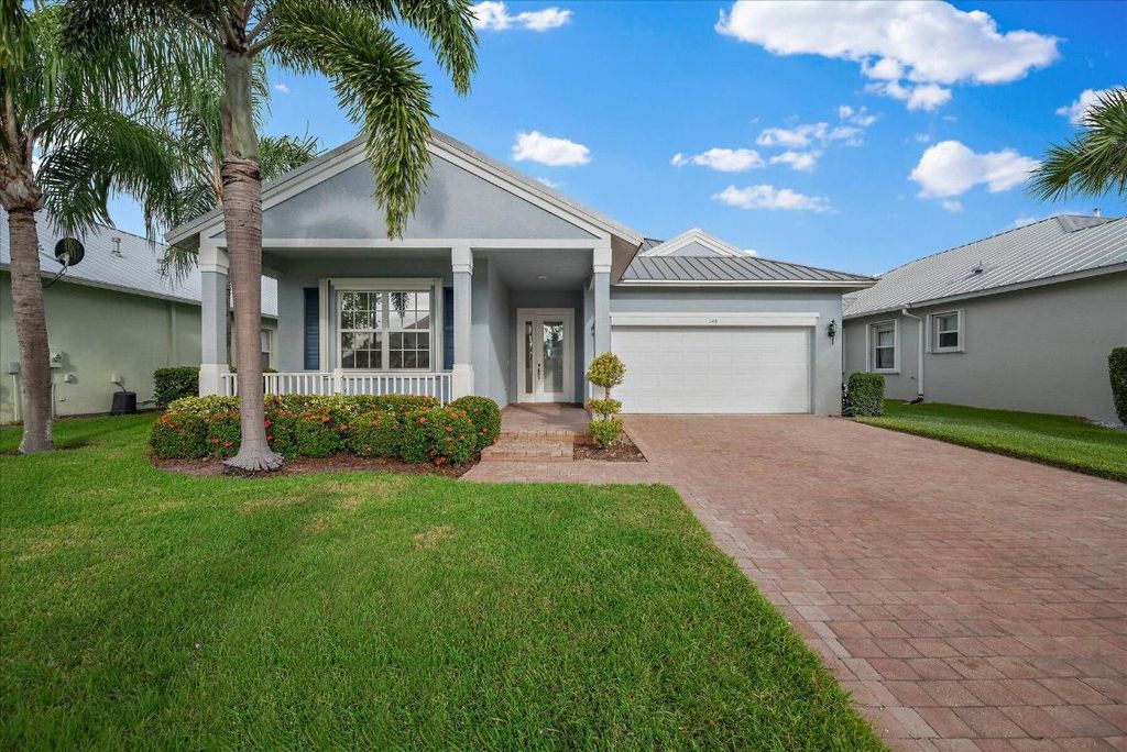 Photo of 148 NW Willow Grove Avenue, Port Saint Lucie, FL 34986 (MLS # R10930931)