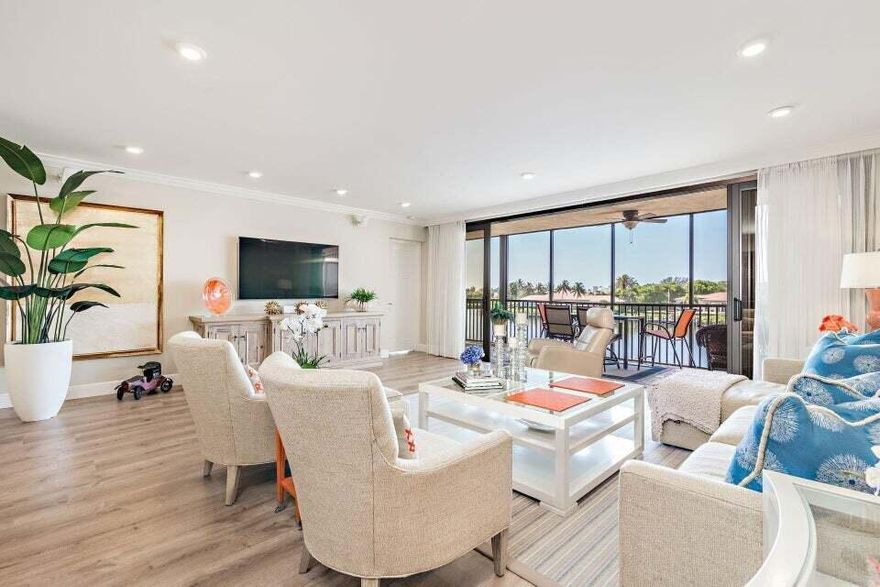 One of the most spectacular units to ever come on the market in Jonathan's Landing. Boater's take note: dockage for small and large boats are offered in the community marina directly behind the unit with easy access to the Jupiter Inlet. Enjoy awesome water views from the oversized screened-in balcony. Every aspect of this incredible unit has been tastefully redone to perfection. The custom designed kitchen is any chef's dream boasting Kenmore Elite appliances (induction stove, convection oven, and wine refrigerator) soft touch drawers, pantry and ample storage. Home furnishings, draperies, and carpeting were decorated by Eccentricity. Additional home features include: full impact glass stacking sliders, plantation shutters, barn doors, custom built-in storage, frameless shower doors, and