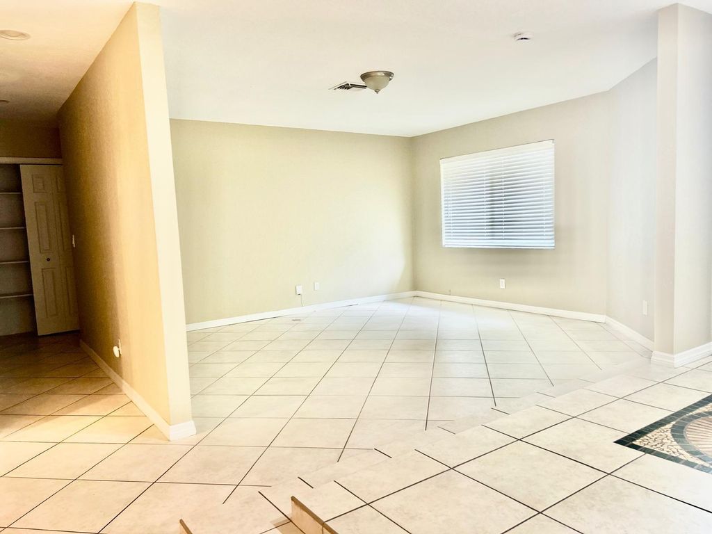 Photo of 222 NW 92nd Terrace, Coral Springs, FL 33071 (MLS # B26011182)