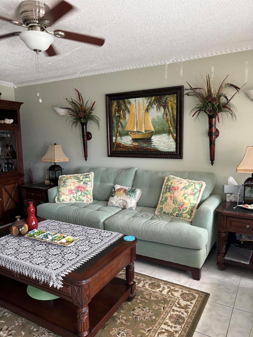 This condo is a rare find.  The furniture is exquisite and comfortable.  All furniture and furnishings convey except closing and personal items.  The crown moldings is a beautiful addition to this ready to move in condo.