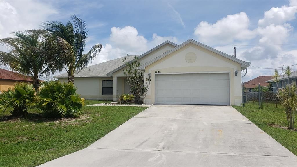 Photo of 1073 SW Firestone Avenue, Port Saint Lucie, FL 34953 (MLS # R10727682)