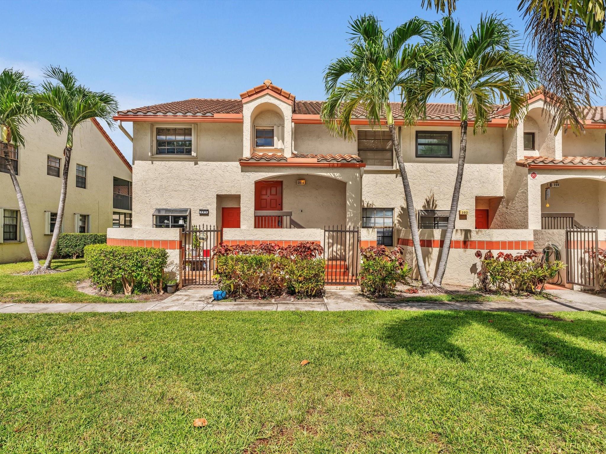 Discover resort-style living at Diplomat Square in gated Independence Bay. This bright, freshly painted, totally updated 2BR + den, 2BA corner unit offers 1,300 sq ft of open-concept living with high ceilings, granite countertops, rich wood cabinetry, and stainless steel appliances. The flexible den is perfect for a home office or reading nook. Accordion shutters and roll-down awnings provide added peace of mind. Enjoy tranquil green views from your private balcony. Just steps from the clubhouse, pools, tennis, and pickleball. Enjoy 24-hour security, playground, 5 swimming pools, and 2-story clubhouse with panoramic lake views. Close to Quiet Waters Park, major highways, and everything Deerfield Beach offers. Make this turnkey property yours today!