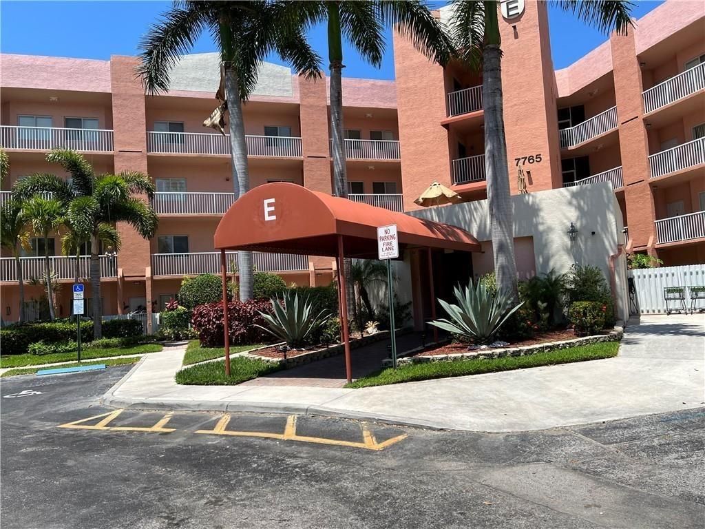 Photo of 7765 Yardley Dr #108, Tamarac, FL 33321 (MLS # F10480578)
