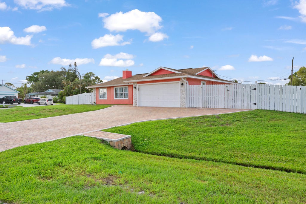 Photo of 402 SW SEAFLOWER TER, Port Saint Lucie, FL 34984 (MLS # B26073999)