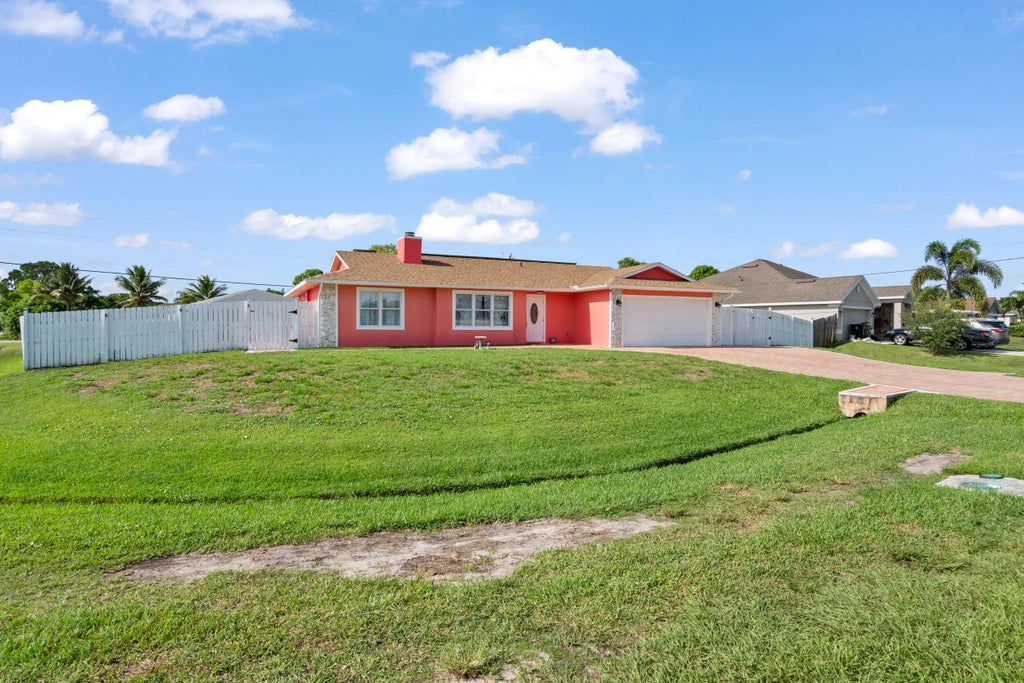 Photo of 402 SW SEAFLOWER TER, Port Saint Lucie, FL 34984 (MLS # B26073999)