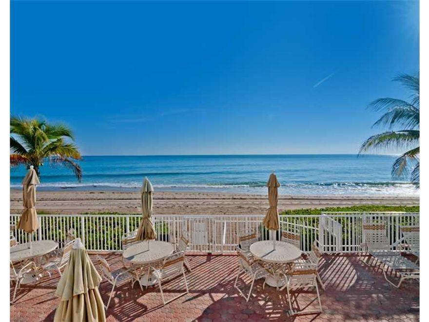 SPECTAULAR DIRECT OCEAN VIEWS!!!  UNIT BOASTS SUNNY SOUTHERN EXPOSURES..PRIVATE BALCONY...BRAND NEW  REMODELED KITCHEN WITH CUSTOM CANADIAN MAPLE CABINETRY, BEAUTIFUL SLABS OF GRANITE, TILE BACKSPASH, LED CABINET LIGHTING..NEW SS SAMSUNG APPLIANCES, OVERS IZED PANTRY AND CUSTOM B-FAST TABLE ** ONE OF 5 UNITS IN THE BLDG. W/ WASHER & DRYER! * HURRICANE IMPACT WINDOWS THROUGHOUT!  INCLUDED IN YOU HOA PAYMT IS: CENTRAL A/C, WATER, HOT WATER, CABLE,  OPEN PARKING, OR $33.00 PER MONTH FOR A GARAGE SPACE. P-FECT