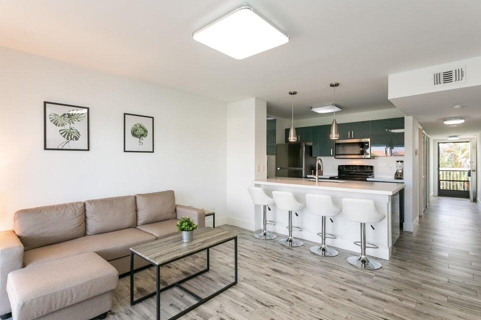 Welcome to this beautiful oasis in PGA National! This 1 Bedroom, 1 Bath unit boasts stunning lake views and is fully furnished for your convenience.Features include: Laminate and tile flooring throughout for a fresh and modern look. Newer cabinetry in both the kitchen and bathroom for ample storage space. Sleek quartz countertops and stainless steel appliances for a contemporary feel. Enjoy the tranquility of lakefront living while being just minutes away from PGA National's renowned amenities and golf courses. Available for immediate move-in, this turnkey property is perfect for those seeking comfort and style in a premier location. Don't miss out on this opportunity!