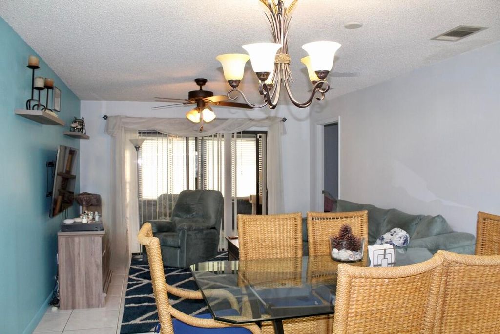 Photo of 566 SW Sara Boulevard, Port Saint Lucie, FL 34953 (MLS # B26003856)