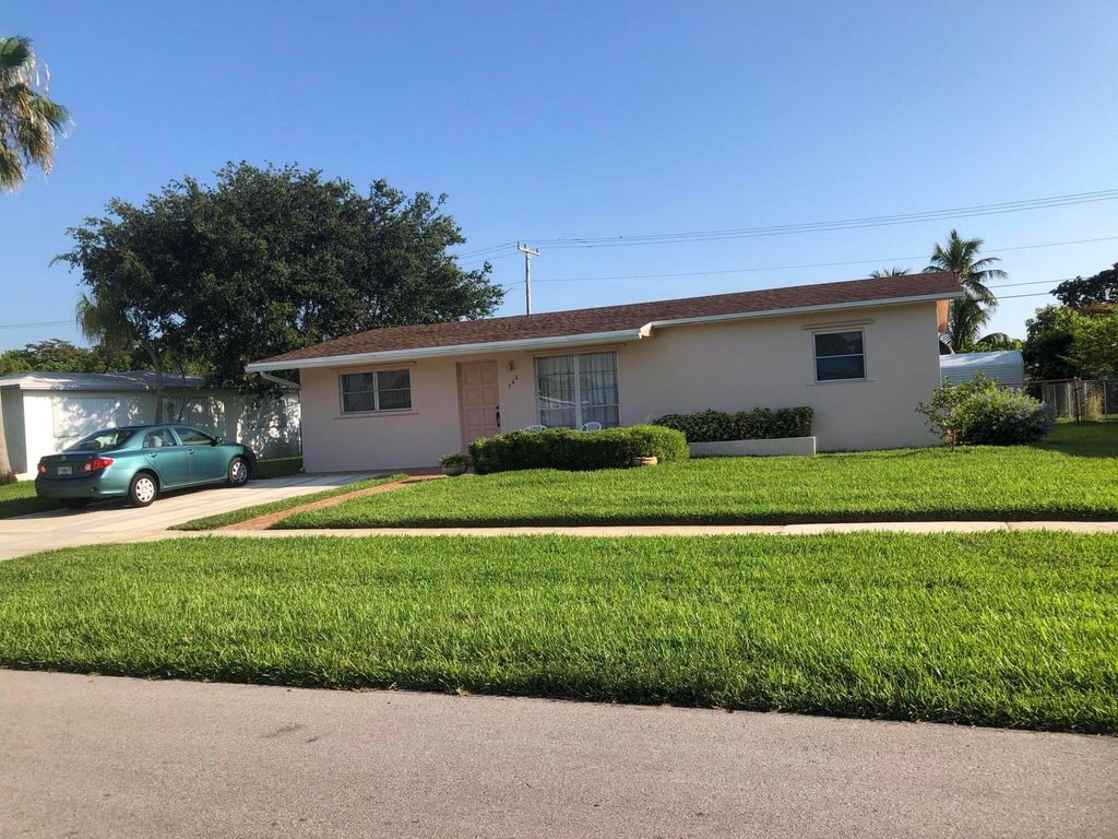 Photo of 340 Cavalier Road, Palm Springs, FL 33461 (MLS # R10991954)